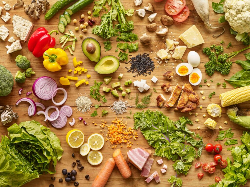 A table filled with fresh, colorful ingredients ready to cook